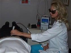 providing class 4 laser therapy to  decrease pain , inflammation, and promote healing