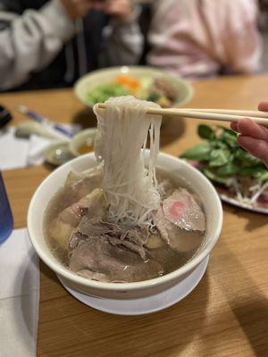 Pho with rare steak and tendon