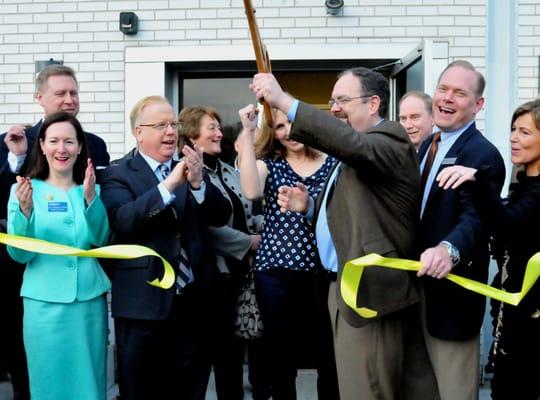 Tom and Ron (owners) cutting the ribbon at the Grand Opening with Mayor Boughton!