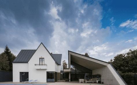 Custom Metal roofing and sheet metal siding work for this truly unique home.