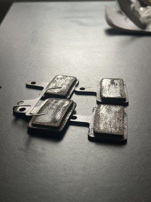 Brake pads AFTER they serviced them. Lol.