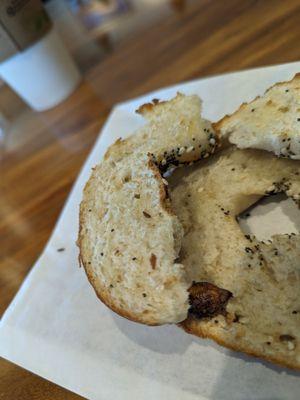 Dry bagel that was supposed to be with butter. Bagel good, lack of any butter, bad.