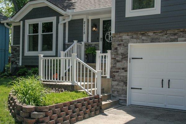 New James Hardie Cement Siding, Vinyl Railing, Stone Front, Garage Doors and Thermal Insulated Windows and Front door