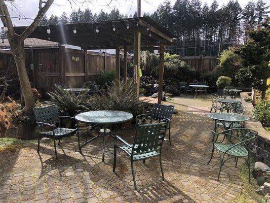 Outdoor patio with koi pond.