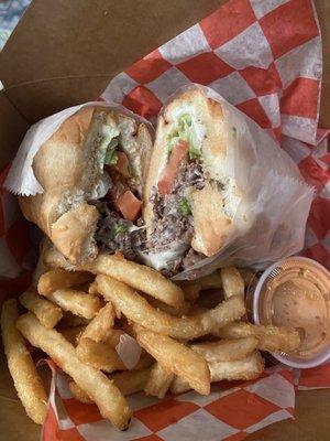 Steak and cheese with fries and chipotle sauce