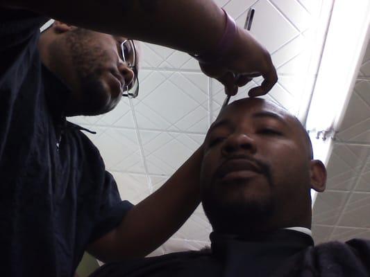 DeMario Williams aka Pooh D.......keeps my fade/LINING game on point!