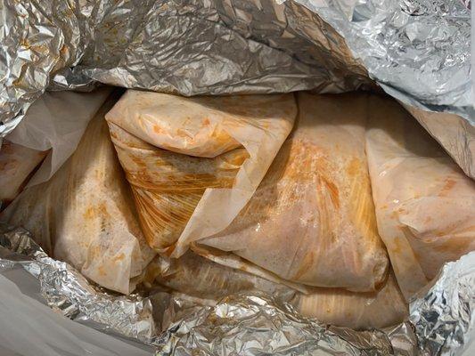 Red pork tamales , dozen wrapped in foil