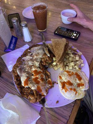 Giant, fresh, chicken fried steak breakfast.