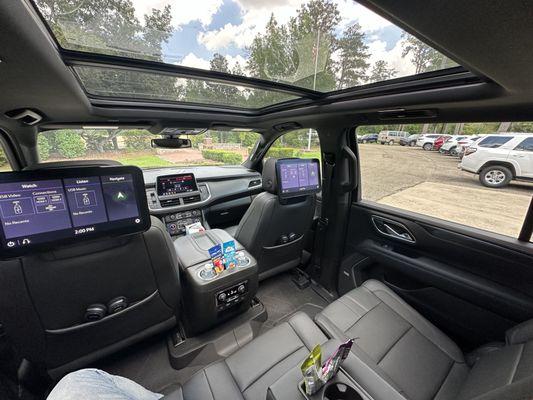 Interior of black VIP Black Suburban