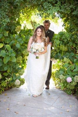 Here Cones the Sun, I love the lush greenery surrounding the bride Vine Hill House Elle Jae Photography