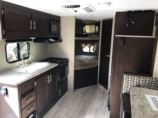 The bunks are nice and big for the kids. I love the deep sinks. We added a nice folding barstool for an extra seat at the table.