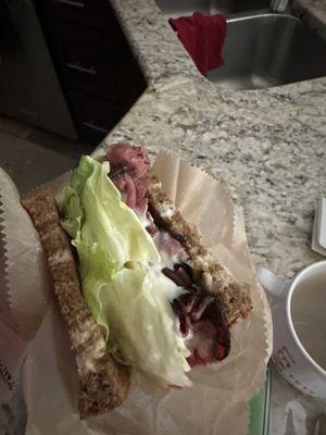 Pastrami half sandwich