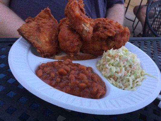 Half a chicken with baked beans and slaw