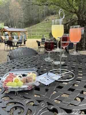 Mimosa wine flight and 2 cheese charcuterie board