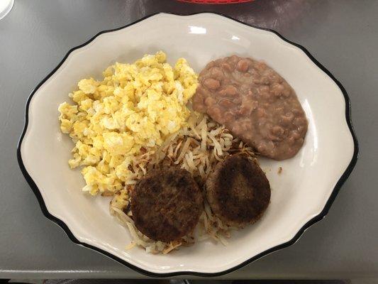 Lucy's Favorite - scrambled eggs, refried beans, hash browns and sausage patties.