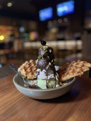 Italian pistachio cherry gelato sundae that is prepared table side.