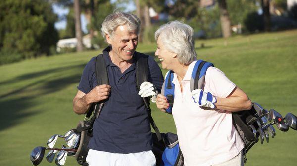 Couple golfing