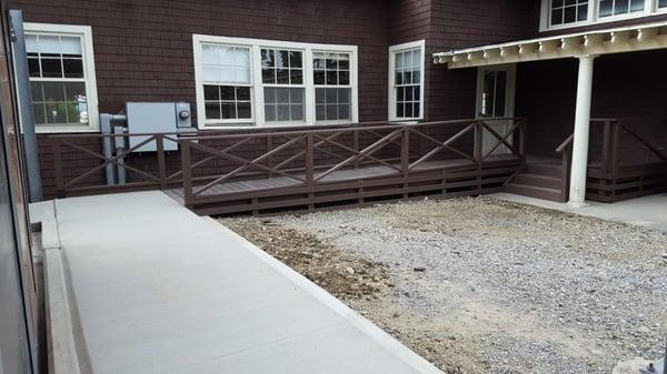 Custom treated/composite deck and ramp to match existing design.