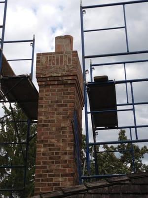 Masonry chimney ready to tear down and rebuild - current structure in bad shape.