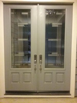 Very happy with our doors! Photo taken at night