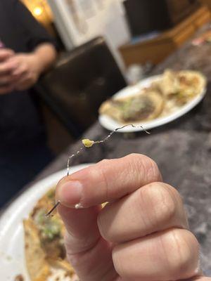 A long metal in a shrimp taco