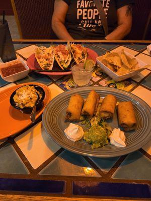 Tacos Americanos, chicken mini chimis and street corn