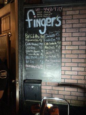 Outside food menu, street food vendor providing food you can take inside Brickyard.