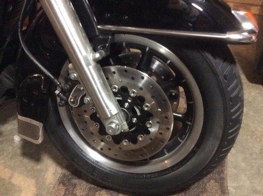 New front tire, dual floating discs, wheel bearings and rebuilt calipers