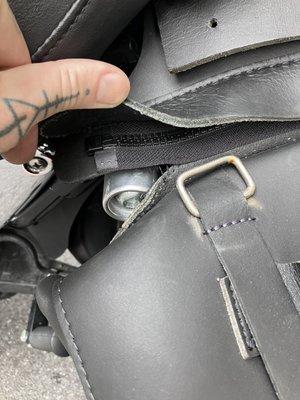 Saddle bag's damage, there's even more damage inside, due to the fact that he did not secure them correctly and rode with them.