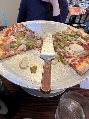 Supreme pie. Look at the size of the vegetable slices. Somehow we got half sliced room temperature meatballs and no sausage. 28 bucks.