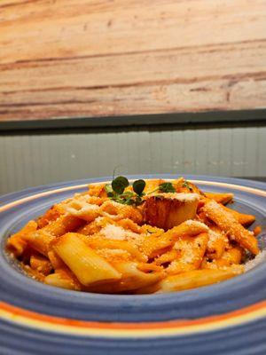 creamy tomato basil vodka sauce, parmesan, penne with shrimp and scallops