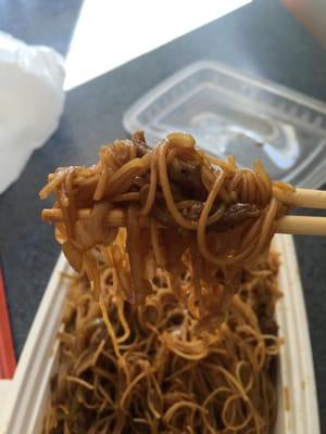 Closeup of chow mei fun (thin rice noodles)