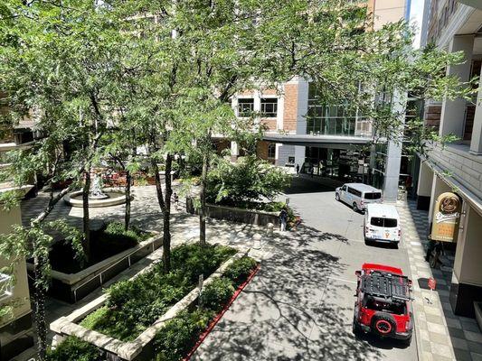 Outside of the building. It is connected to the Hyatt and has access to the parking garage.