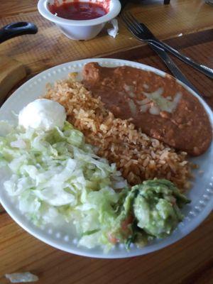 Rice, beans, lettuce, sour cream, and guacamole