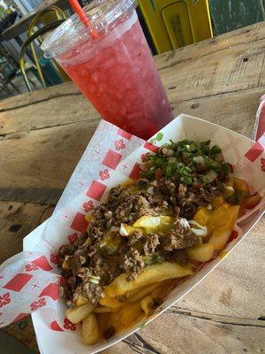 Carne Asada Fries and hibiscus aqua Aguas Frescas