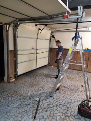 Michael repairing my garage door.