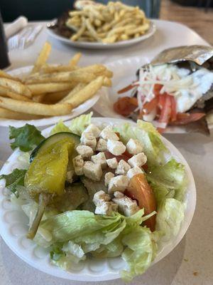 Small Greek salad (I picked off the Greek olives) side of fries (best fries ever!) and gyro.