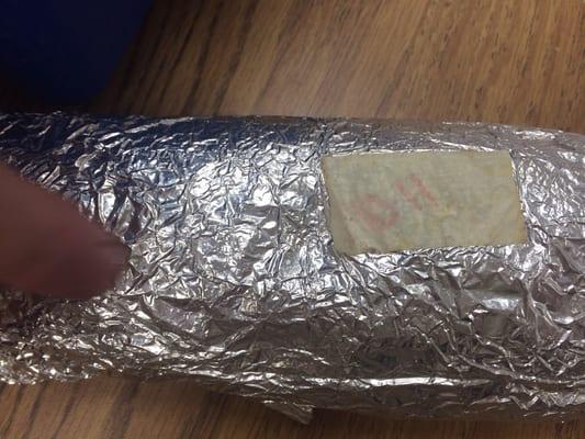 The proof: tape on the used foil that shows the date the sandwich was made. October 11 and it was delivered on the 15th.