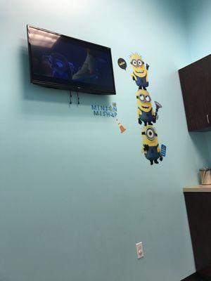 Inside of the exam room with zootopia on the tv.