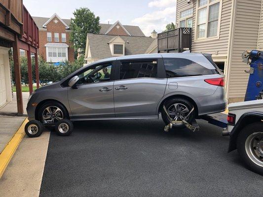 Seriously a tight situation but they got my 203" minivan out of a single car garage door.