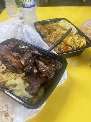 jerk pork w/ rice & peas and cabbage curry chicken w/ rice & peas and cabbage