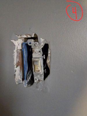 Another outlet, whereas the drywall hole is too big for an outlet cover