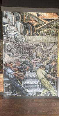 Replica of Diego Rivera's mural greets you at the entry