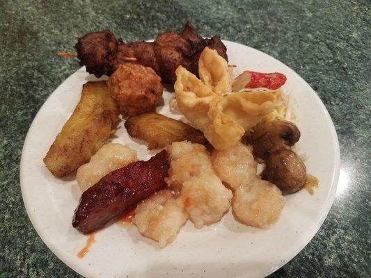 Plantains, fried chicken ball, shockingly tender chicken satay, crab rangoons, mushrooms, ribs, and walnut shrimp