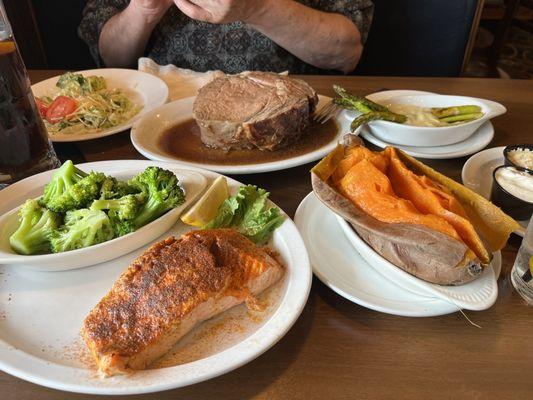 24oz Prime Rib, fresh asparagus and Cajun Salmon, broccoli and sweet potato.