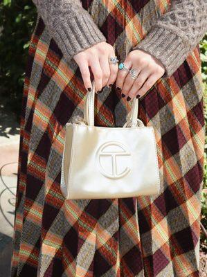 The perfect fall purse, find brands like Telfar and more at DeeLux.