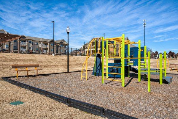 Watch the kids run off some pent up energy at the playground.