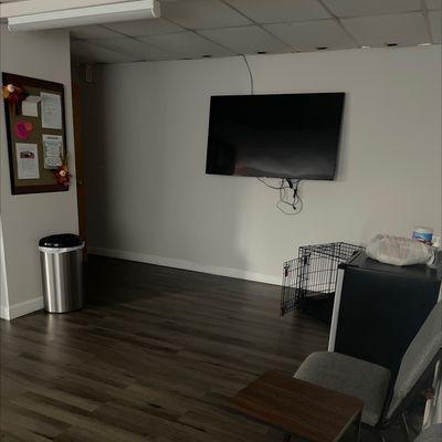 Waiting area w/ TV and clean bathroom