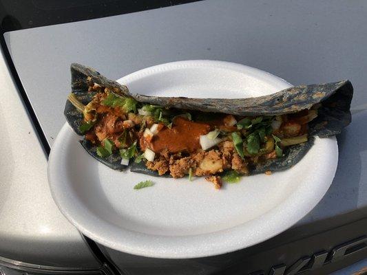 Quesadilla with chorizo potato and squash blossom