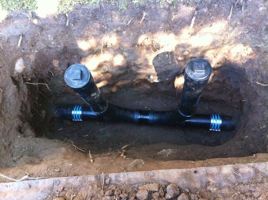 Double sweep clean outs.  Every home needs one for proper access to sewer lines.